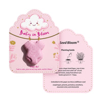 Seed Bloom onesie seed pop favor packaging showing planting guide with Baby in Bloom pink onesie design and wildflower seed instructions
