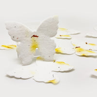 Set of 50 large yellow butterfly seed paper favors β sustainable and symbolic keepsakes.