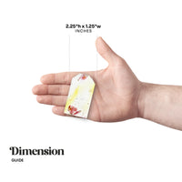 Hand holding a Pink and Yellow Blank Tags Plantable Seed Paper by Seed Bloom Gifts to visually demonstrate its 2.25"h x 1.25"w dimensions for scale.