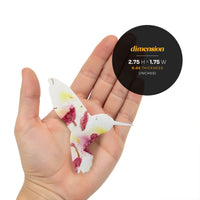 A person holds a small bird with a flower, highlighting the Hummingbird Memorial Plantable Seed Paper concept