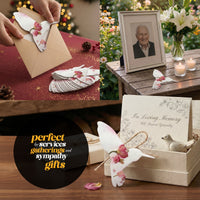 A person holds a small bird with a flower, highlighting the Hummingbird Memorial Plantable Seed Pape