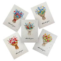 Four floral thank you cards displayed together, featuring vibrant flowers and a heartfelt message of gratitude