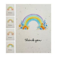 Bloom thank you cards featuring watercolor rainbow design with wildflowers in purple, yellow, blue, and orange tones, displaying handwritten 'thank you' text