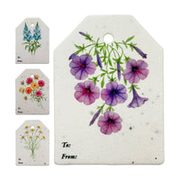 A collection of four thank you tags adorned with painted flowers, titled "Bloom Thank You