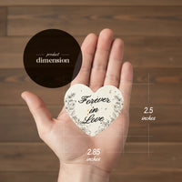 Heart-shaped seed paper 2.5x2.85 inches with Forever in Love text product dimension guide held in hand