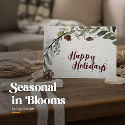 Collection of five plantable seed paper holiday cards featuring assorted designs, including Christmas bells, a festive wreath, a cardinal on a pine branch, and colorful ornaments by Seed Bloom Gifts