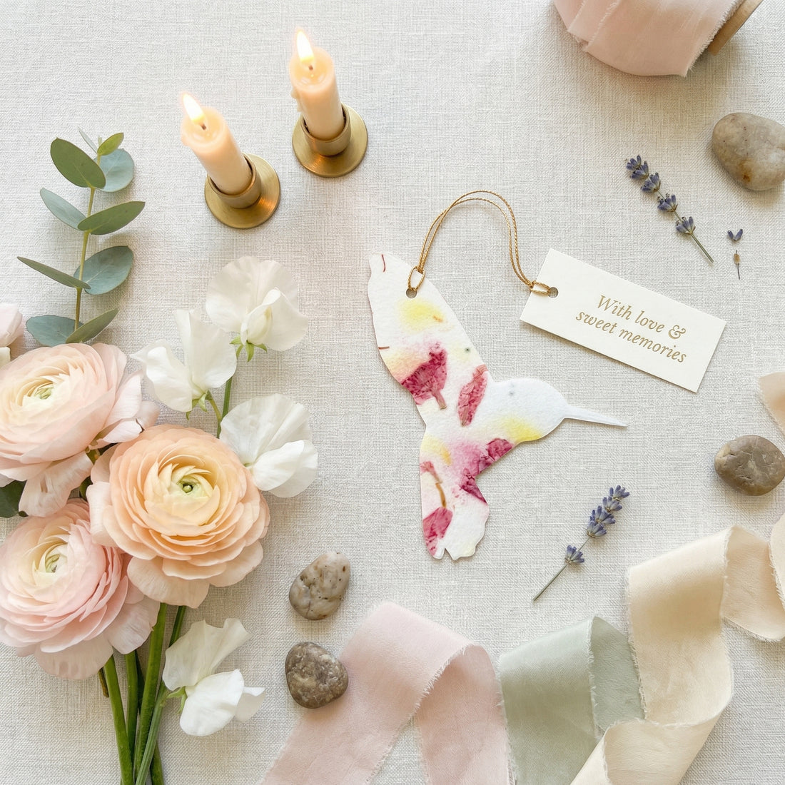  Hummingbird-themed wedding decoration featuring plantable seed paper for a unique and eco-friendly touch