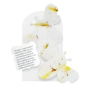 bee-shaped seed paper with floral design on a white background