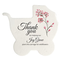 red Carriage-shaped baby shower favor by seed bloom gifts with pink flowers and text on a white background