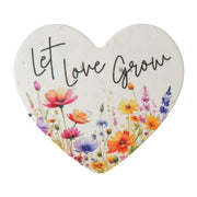 Heart-shaped sign with 'Let Love Grow' text and colorful flowers on a white background Plantable heart wedding favors
