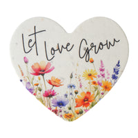 Heart-shaped sign with 'Let Love Grow' text and colorful flowers on a white background Plantable heart wedding favors