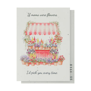 Mother's Day Bloom Card: Illustration of a pink flower shop storefront with colorful potted flowers and plants, text reading 'If moms were flowers, I'd pick you every time.