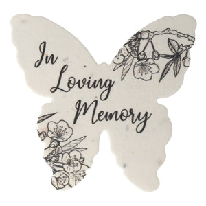 Butterfly-shaped memorial plantable favor by Seed Bloom Gifts with 'In Loving Memory' text and floral designs on a white background