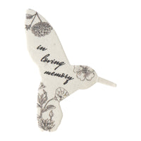 Plantable memorial Decorative angel wing with floral patterns and 'in loving memory' text on a white background by Seed Bloom Gifts