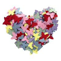Butterfly-shaped Confetti Seed Paper in rainbow colors arranged in heart form