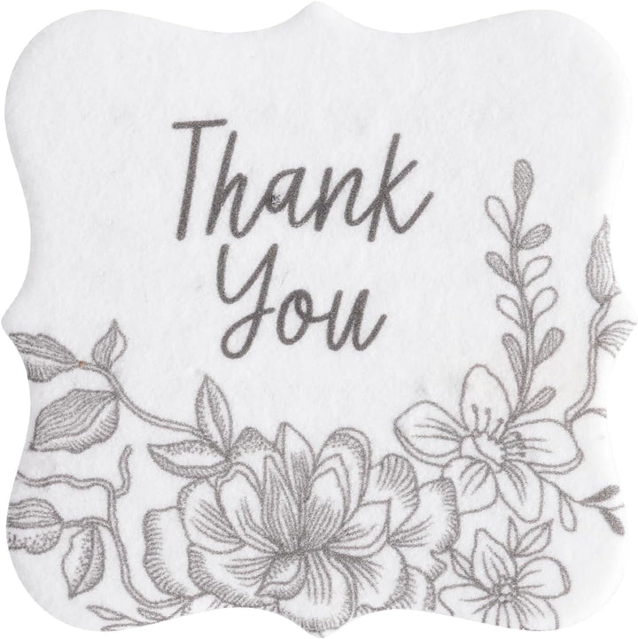 Decorative item with 'Thank You' text and floral designs on a white background