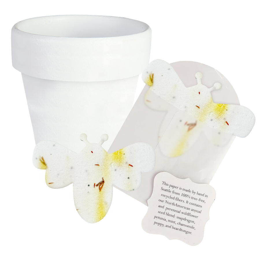 White paper with Bee Shaped Seed Paper Baby Shower Favor By Seed Bloom Gifts illustrations and a message on a white background