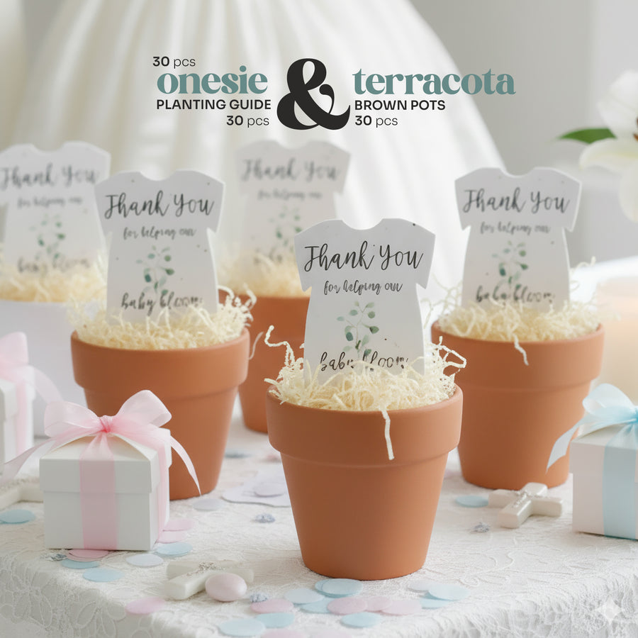 Staged photo of five terracotta pots holding gender neutral green onesie plantable seed paper by Seed Bloom Gifts favors and planting guide
