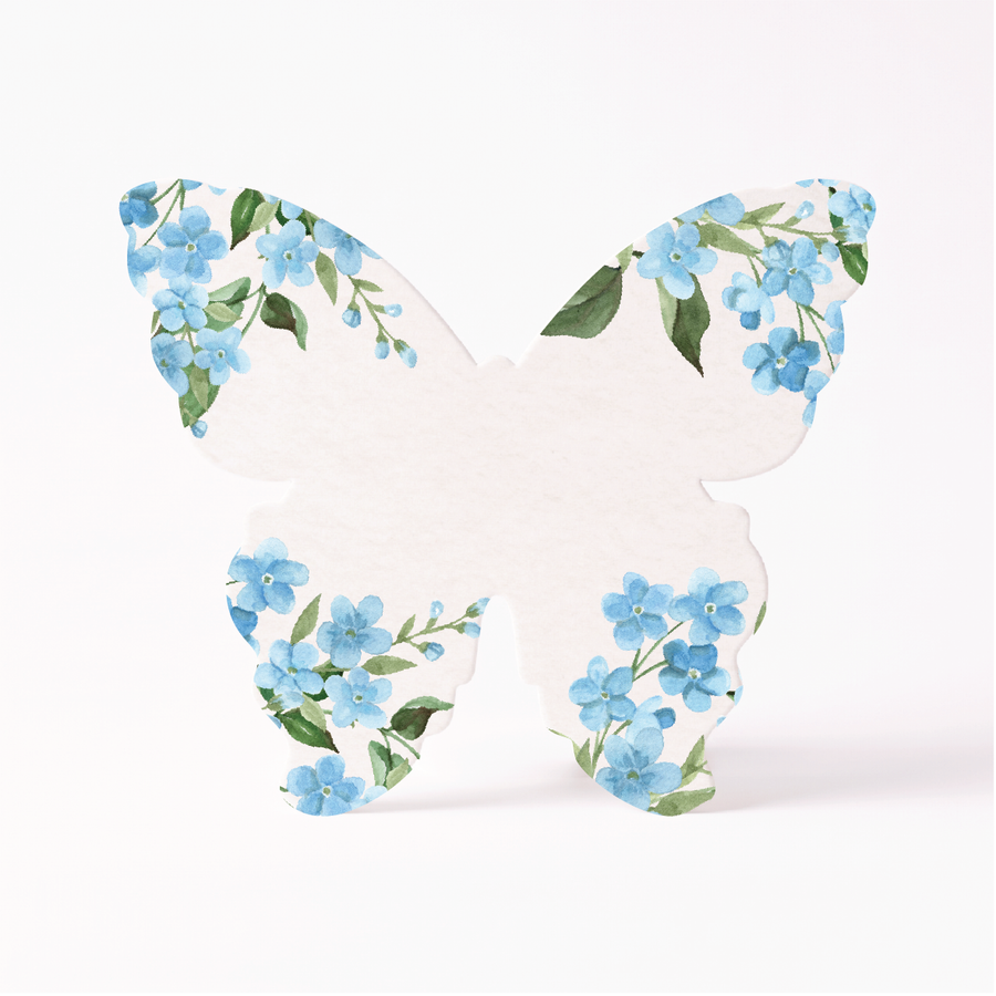 Personalized funeral favors in butterfly shape with blue forget-me-not flowers and blank space to customize