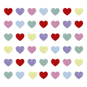 Pattern of colorful heart shapes on a white background