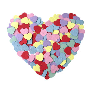 Heart-shaped collection of colorful heart-shaped objects on a white background