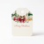 Personalized Merry Christmas gift tag with a garland of burgundy, green, plaid, and polka dot bows with pine sprigs