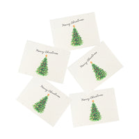 Set of Christmas-themed coasters with trees and 'Merry Christmas' text on a white background