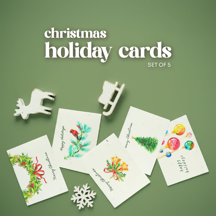 Set of 5 Plantable Holiday Christmas cards by Seed Bloom Gifts with decorative elements on a green background