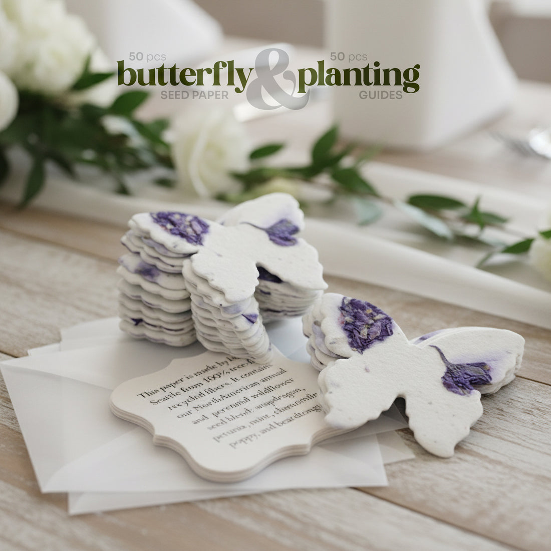 Butterfly-shaped seed paper on a wooden surface with white flowers in the background.