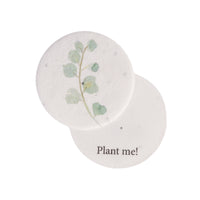 Seed bloom gifts round seed paper with a plantable design and 'Plant me!' text on a white background