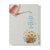 Mother's Day Bloom Card: Illustration of a pink flower shop storefront with colorful potted flowers and plants, text reading 'If moms were flowers, I'd pick you every time.