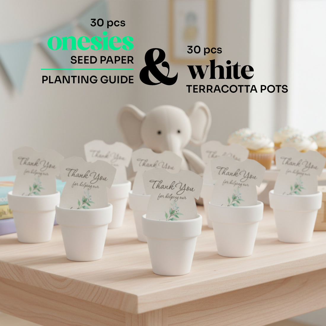 White terracotta pots with seed paper and a toy elephant on a wooden surface.