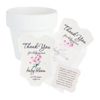 Onesie seed paper baby shower favors with pink flowers bundled with white mini pots and planting guide 