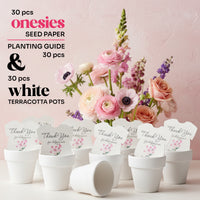 Set of 30 plantable seed paper onesie baby shower favors displayed in white terracotta pots against a pink backdrop with a floral arrangement, labeled as including seed paper onesies and a planting guide.