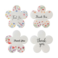 Four floral thank you cards featuring the words "thank you" in various designs, labeled as Bloom Thank You Tags