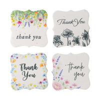 Four floral coasters featuring "Thank You" tags, perfect for expressing gratitude at gatherings or events